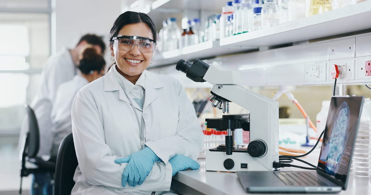 Woman smiling in the lab